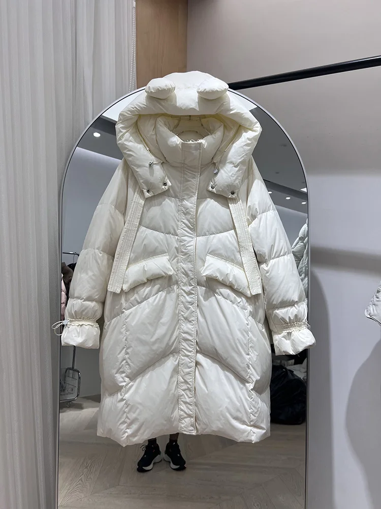 سترة بغطاء للرأس بشريط طويل للنساء لشتاء 2025 سترة جديدة سميكة وعصرية من ريش البط الأبيض العصري #1