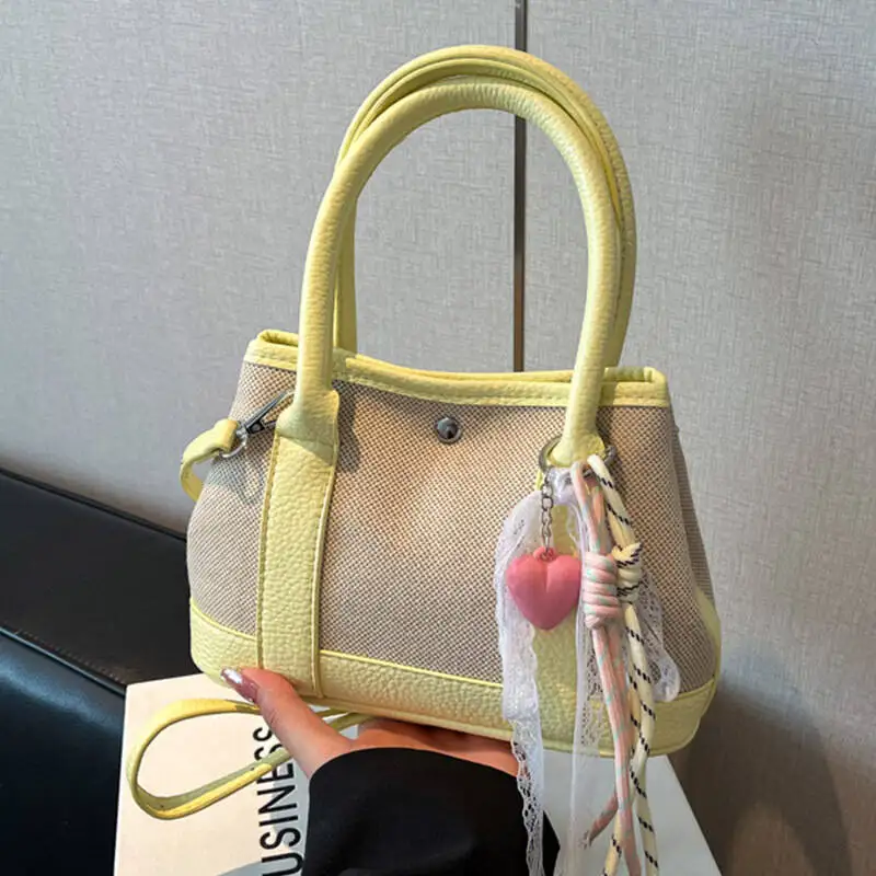 

Korean Style Simple Casual Commuter Handbag 2026 Hot Sale Solid Color PU Handbags Versatile Design Sense New Niche Bucket Bag