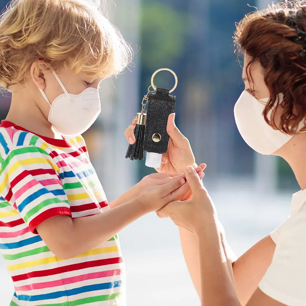 

4pcs Bottle Keychain Portable Refillable Travel Mini Bottle For Liquid Perfume Lotion Soap Outdoor Use Tassel