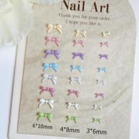100PCS Sweet Adorable Mini Bows Resin Nail Charms Macaron Colored Lines Bowknots Nail Art Decorations for DIY Phone Case Nails