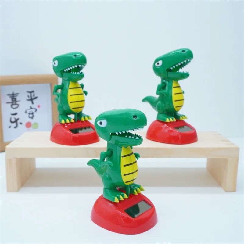 Nieuwe Schattige Tyrannosaurus Rex Solar Speelgoed Creatieve Grappige Automatische Swing Pop Desktop Ornamenten Swingend Hoofd Dinosaurus Speelgoed