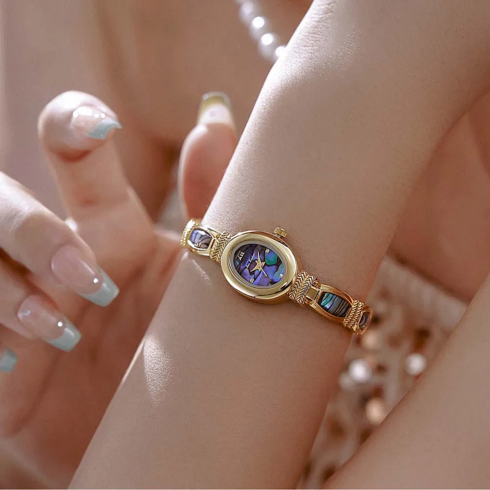 Orologi di lusso alla moda per donna Orologi da polso con bracciale a conchiglia da donna vintage dorato Orologio da donna al quarzo Relogio Feminino