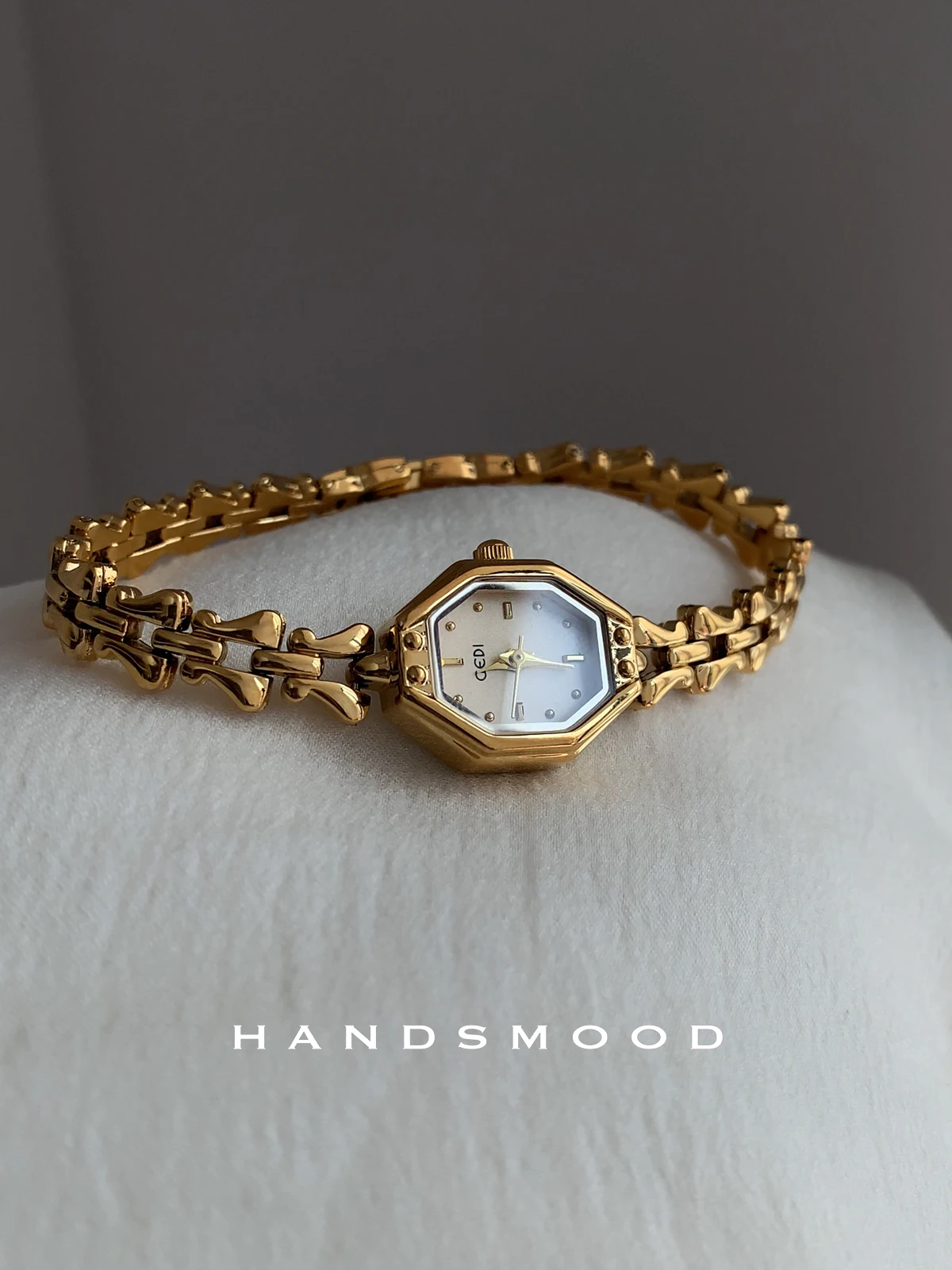 

A stylish and sophisticated small gold watch with a delicate dial, perfect for womena versatile accessory, or a gift for women.