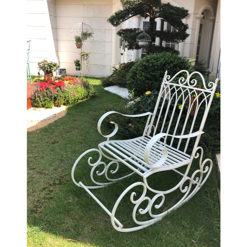 

Wrought iron old leisure rocking chair, balcony nap , outdoor garden happy chair, flower placement, cradle chair, green