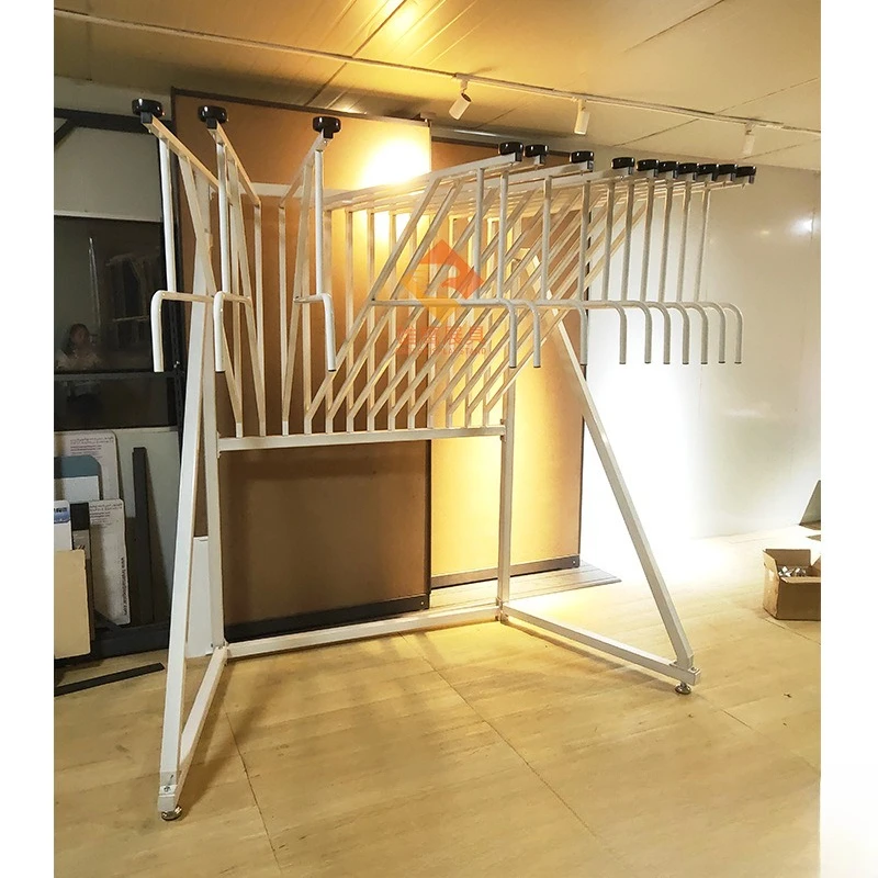 Flip-type carpet display stand, which belongs to a hanging bracket, is used for carpet display 2
