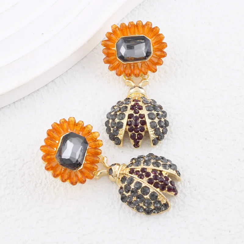 Animal-themed, gem-encrusted, extravagantly colored, everyday style, bee and sunflower-themed vacation earrings