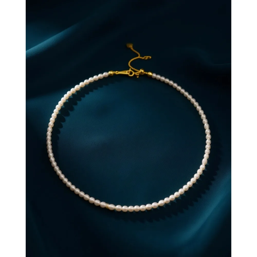 

Ожерелье-чокер из мелких пресноводных жемчужин с позолотой 18K и регулируемой застежкой-слайдером