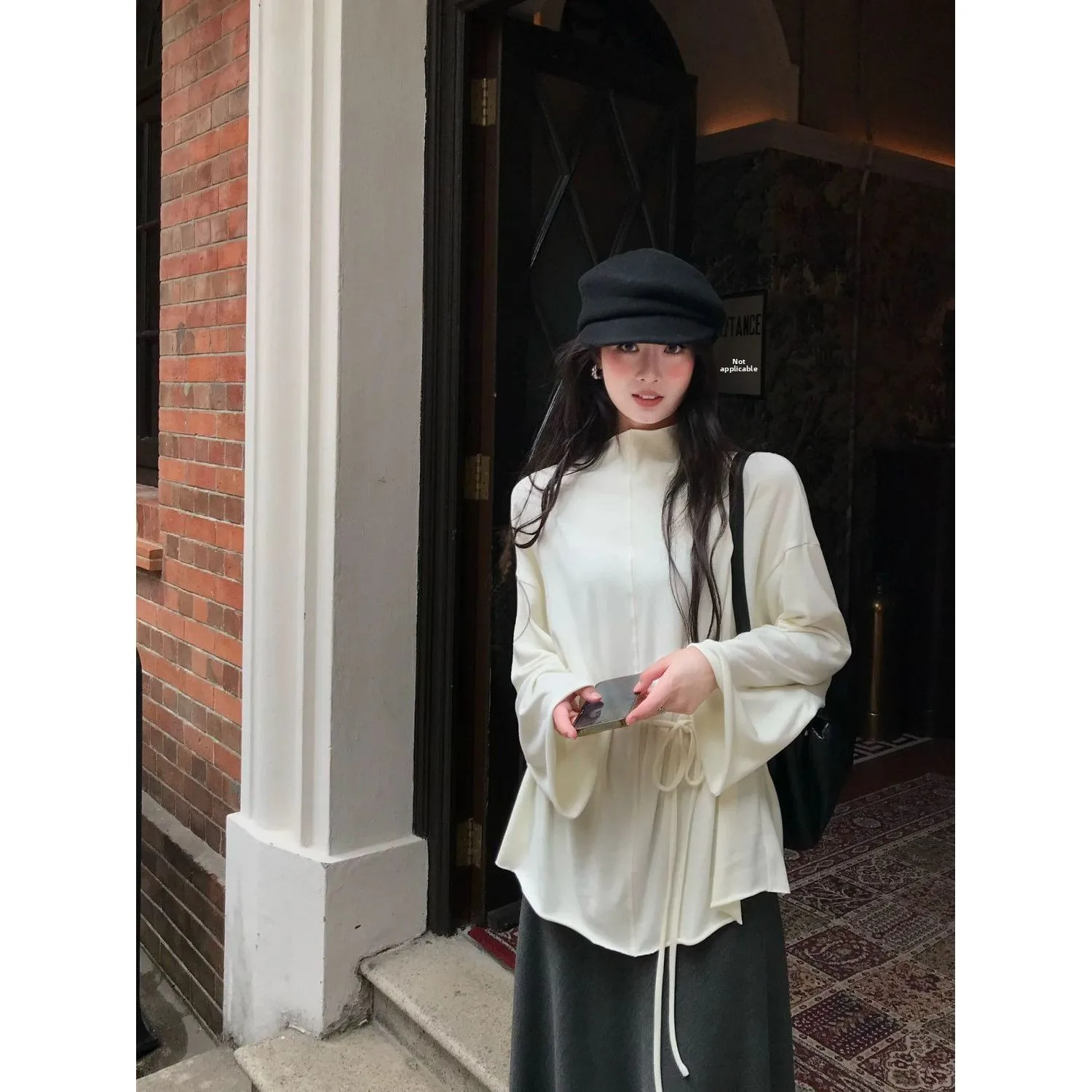 Elegant Creamy-Hued High-Neck Long-Sleeve Top with Waist-Cinching Bell Sleeves And Drawstring Design for Slimming Effect