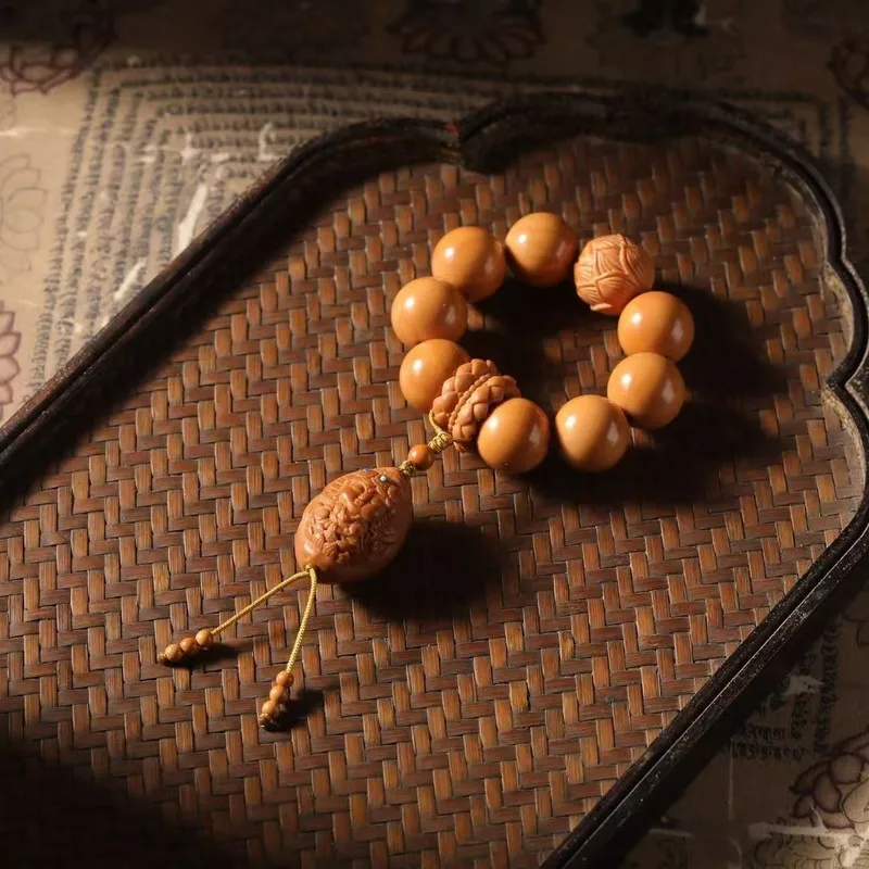 Monkey full round bead stress-relieving bracelet with carved design