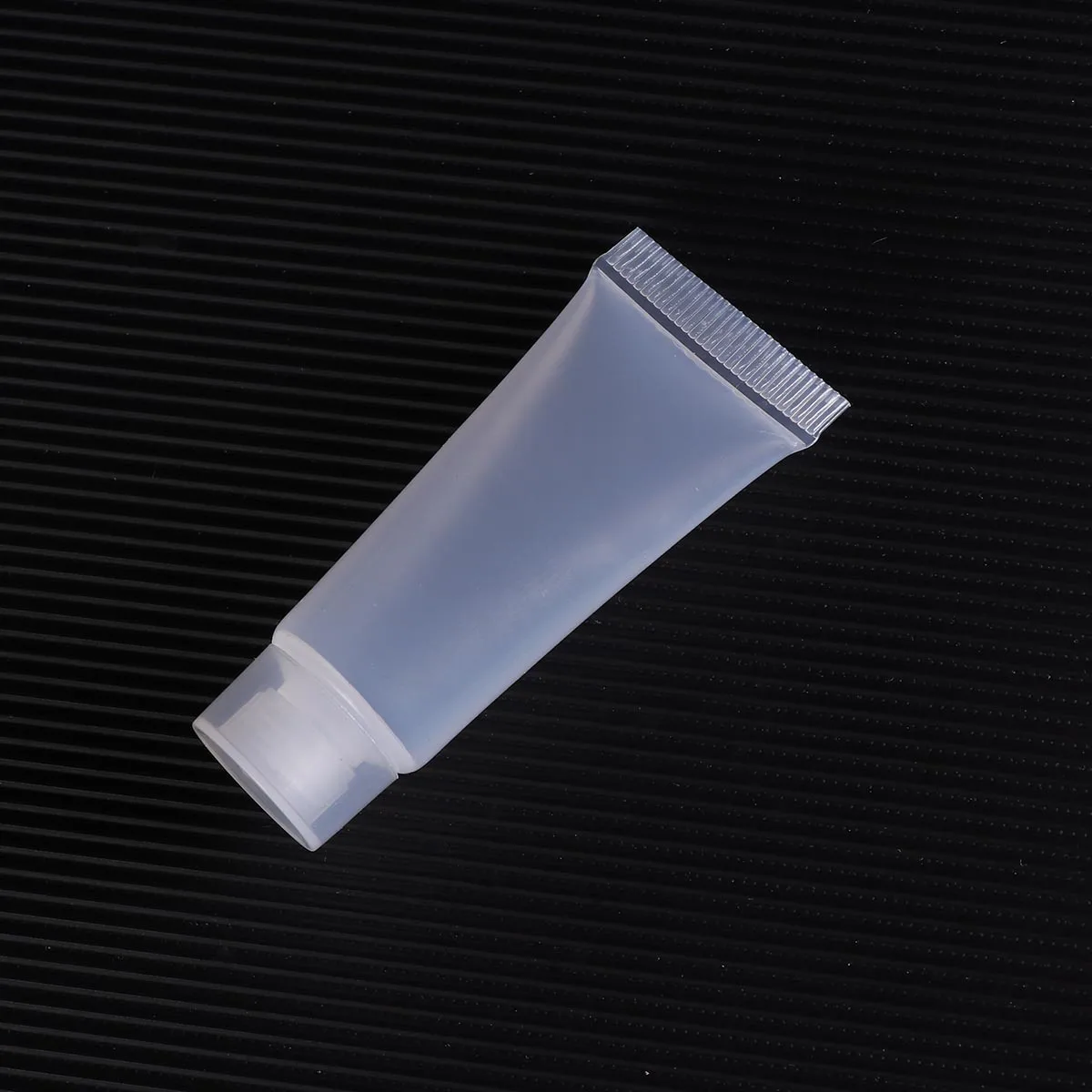 

40Pcs Refillable Travel Bottles Leakproof Plastic Tubes Squeezable Portable Sample Containers for Shampoo Shower Gel Lotion 10ml