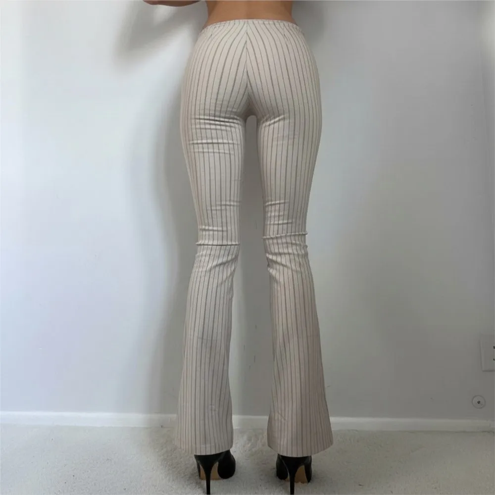 الملابس النسائية سراويل مخططة نمط التنقل غير رسمي السراويل المتوهجة كل مباراة أسلوب بسيط مزاجه التباين الموضة العصرية