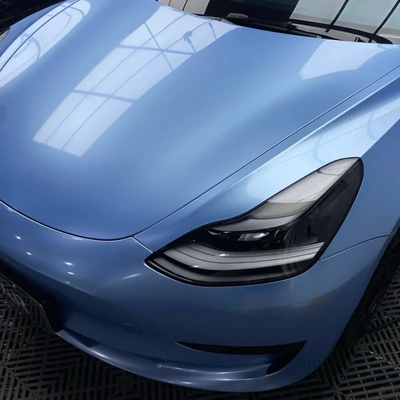Metallic blue self-adhesive car modification sticker, made of durable aluminum foil material and platinum vinyl film.