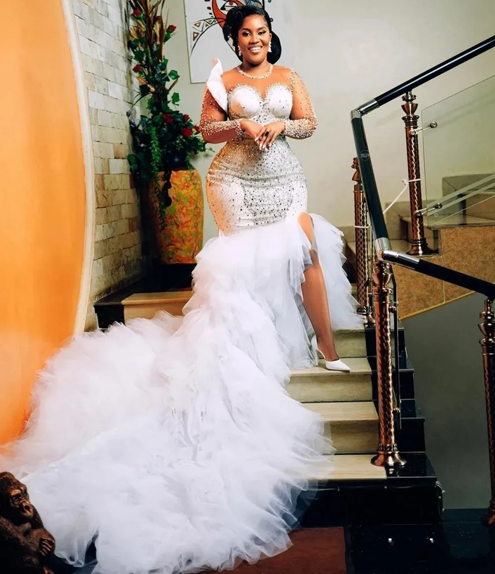 

2025 African Black Mermaid Wedding Dresses Bridal Gowns Plus Size Illusion Long Sleeves Side Split Rhinestones Pearls Beaded