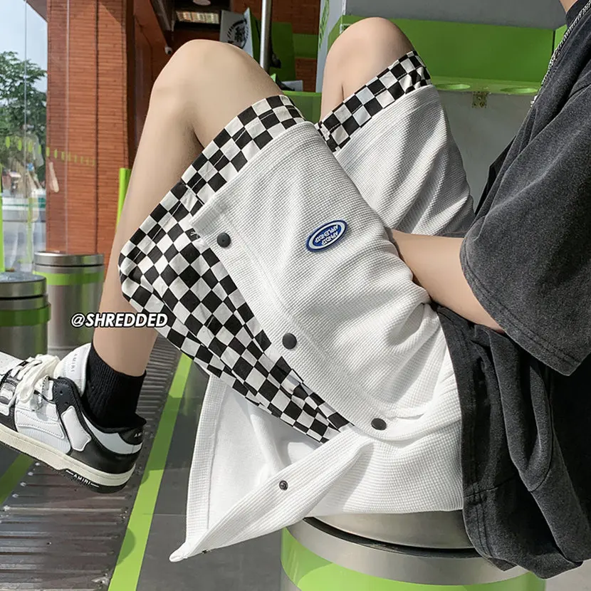 

Летние тонкие свободные спортивные брюки в клетку для мужчин, повседневные модные брюки-капри с эффектом двухслойности, на пуговицах, сшитые из разных тканей, спортивные, стильные