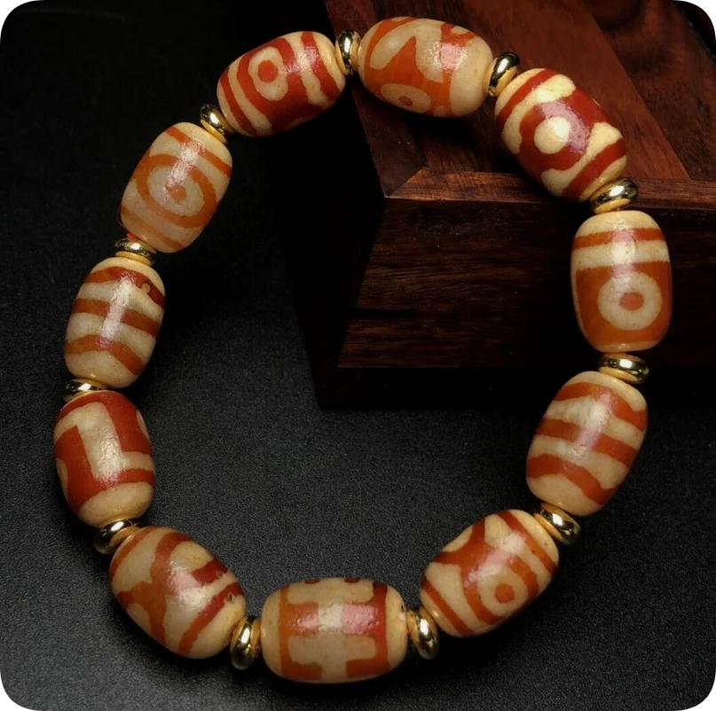 Tibetan Red Meat Noble Three Eyes Tiger Teeth dzi beads 11 * 16mm