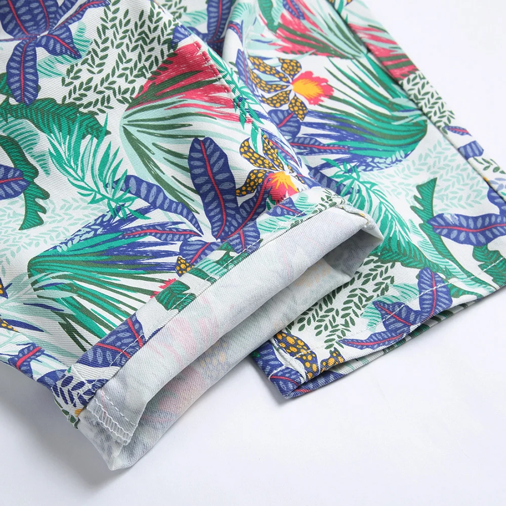 Pantaloncini di jeans elasticizzati con stampa digitale da uomo pantaloni da equitazione con fiori di piante tropicali di moda per l'estate