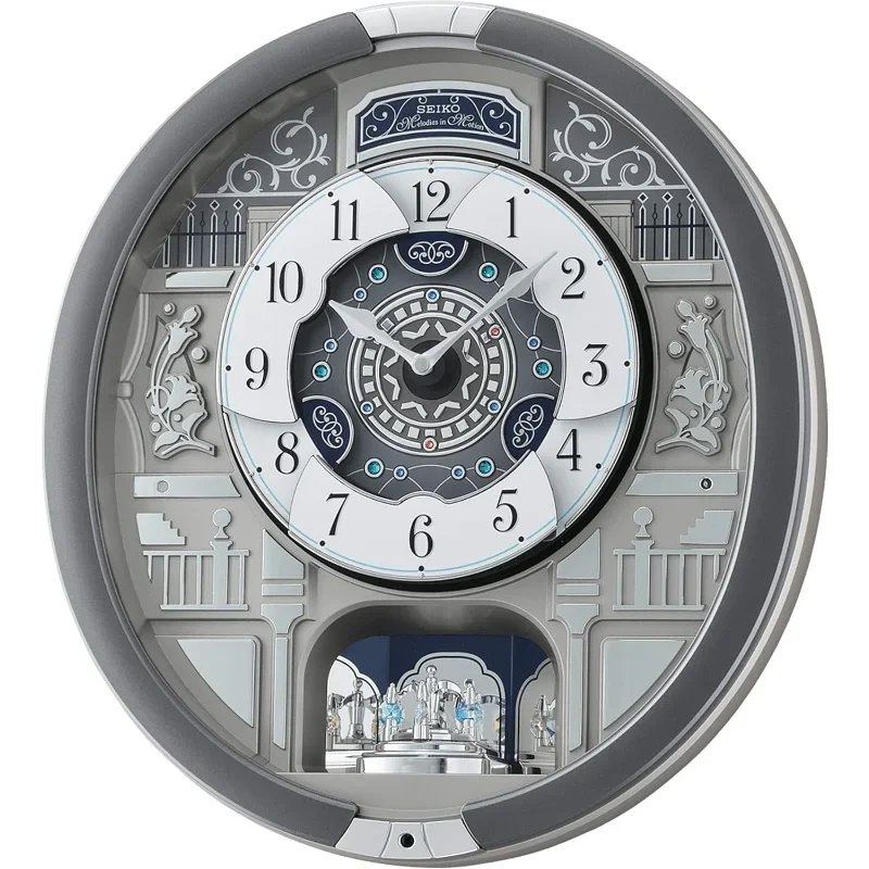 Reloj de pared con melodías en movimiento, motivos musicales