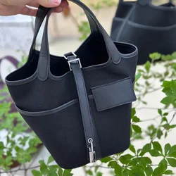 Bolso de mano de tela de vela para mujer, bolsa de cubo de moda, bolso de cesta, tendencia versátil, cuero suave a juego, nuevo