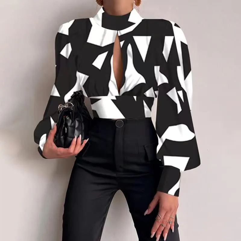 เสื้อครอปแฟชั่นสำหรับผู้หญิง สไตล์เซ็กซี่ โชว์หลัง ลายพิมพ์ แขนยาว ทรงลำลอง เหมาะสำหรับใส่ทำงานหรือไปงานปาร์ตี้