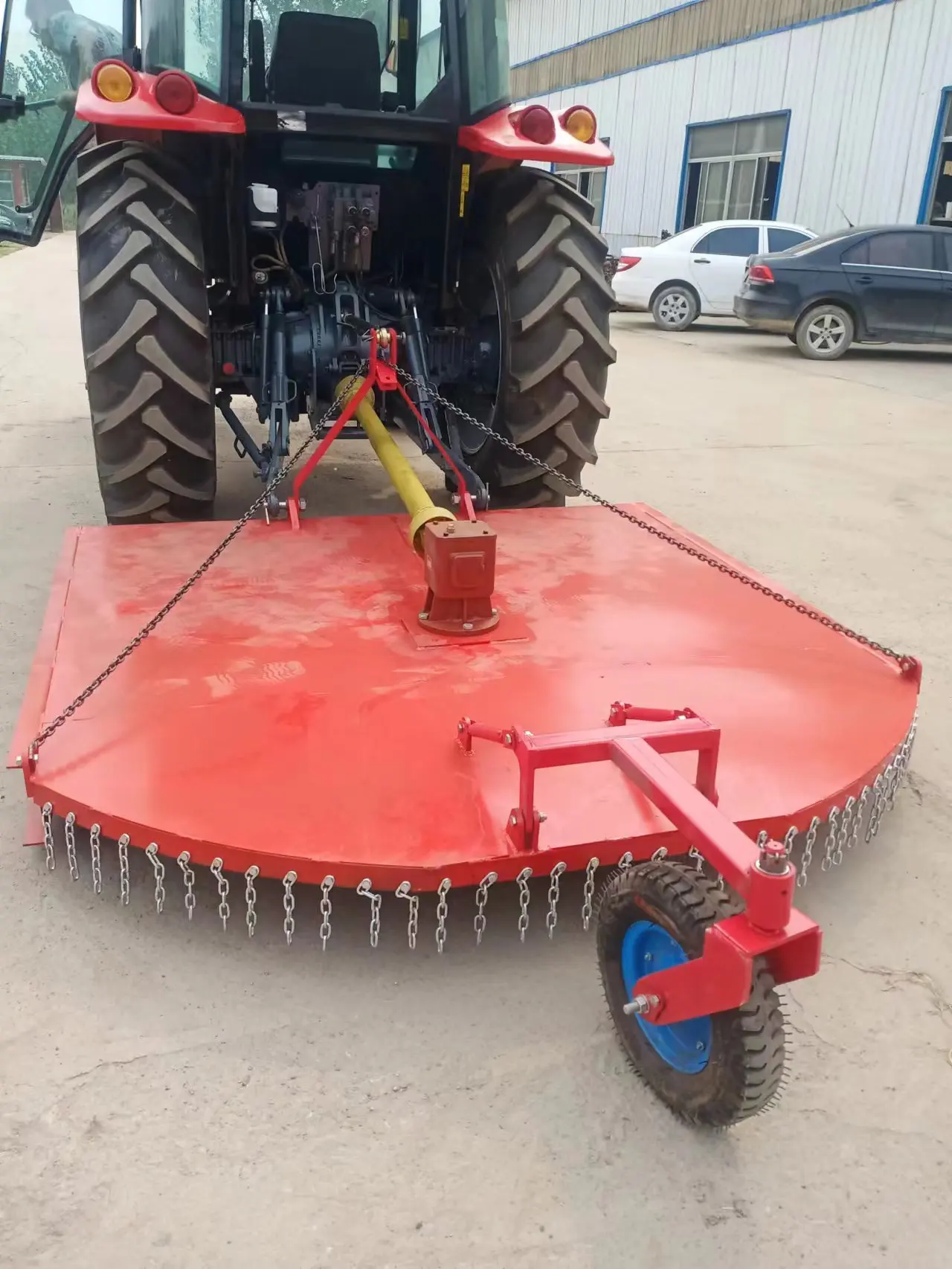 The lawn mower agricultural tractor with a power output shaft is completed by three-point hanging