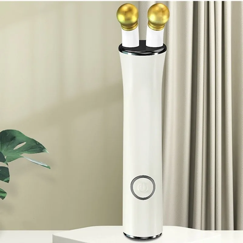 Nowy ręczny masażer do oczu z funkcją grzania i wibracji, urządzenie do pielęgnacji skóry i upiększania.