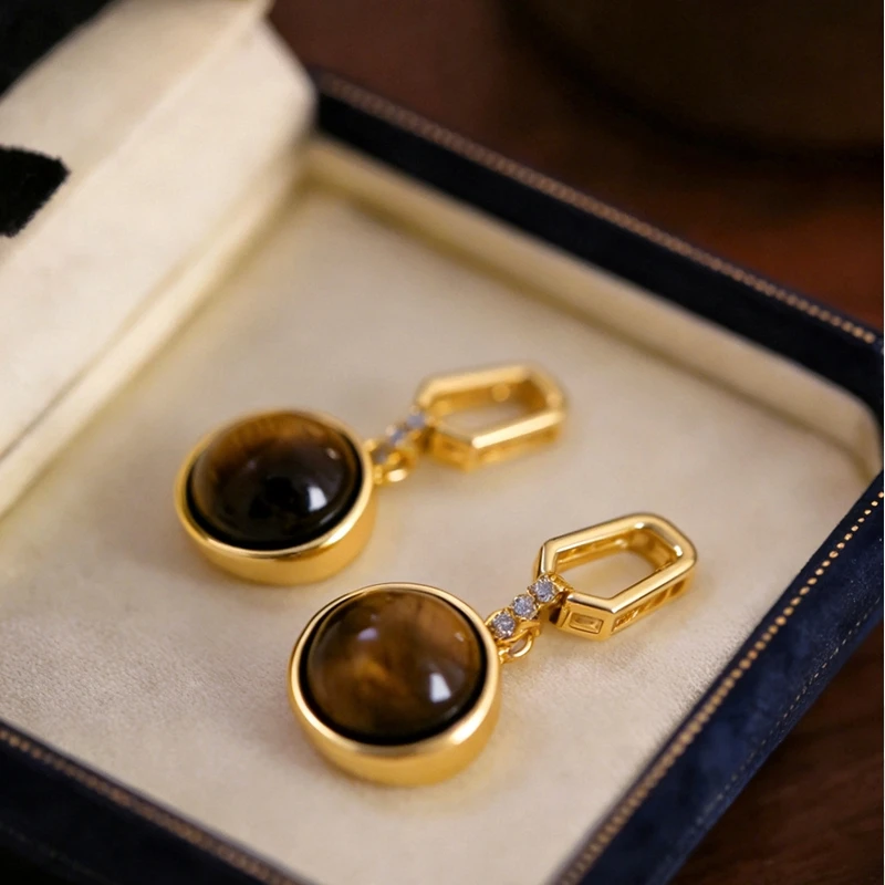 New product s925 silver plated thick gold ear buckle for women with a high-end feel, light luxury style, natural tiger eye stone