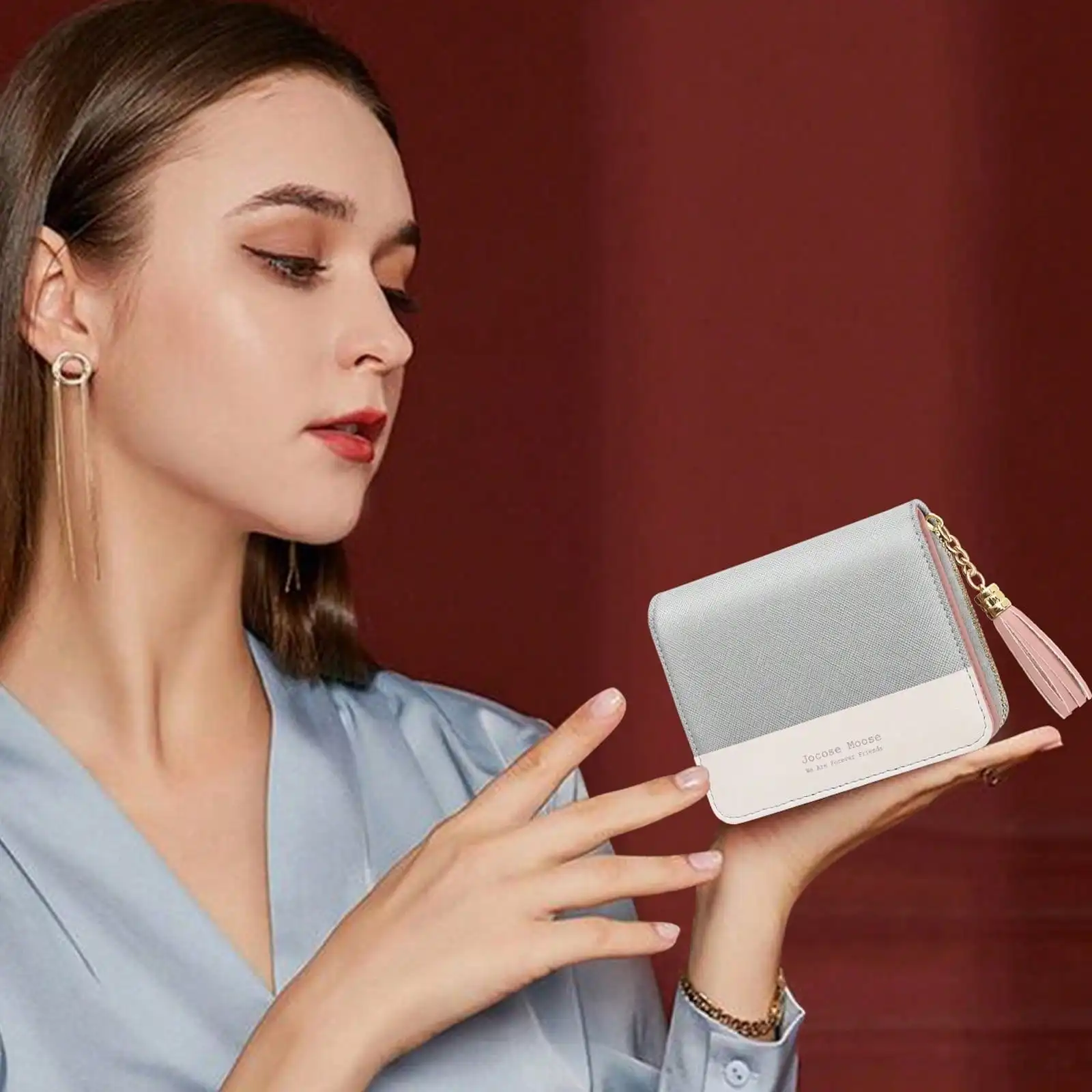 Match your daily outfits with this women’s small PU leather purse with exquisite tassel detail, offered in black and white color options. Built-in RFI