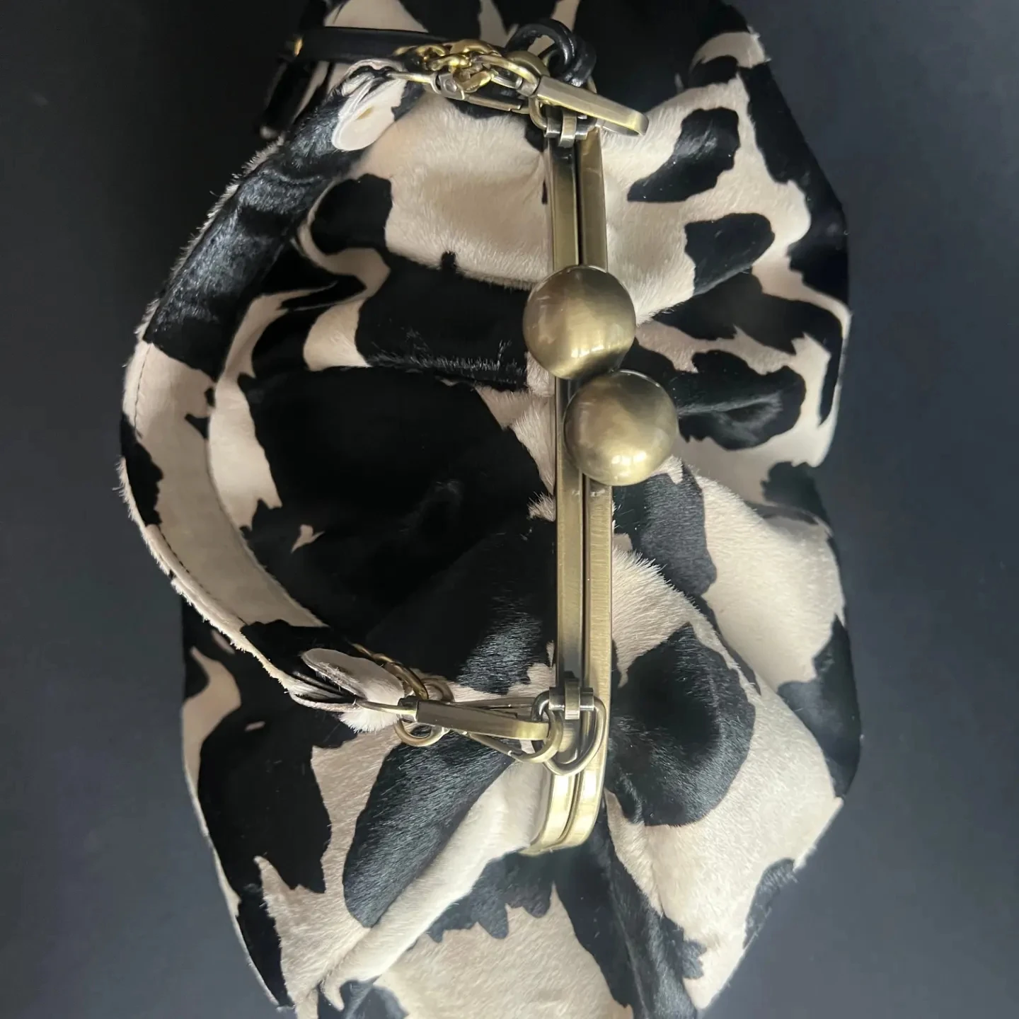 LOST IN VINTAGE Natural Leather Cow Pattern Fabric Clutch Metal Frame Kiss Lock and Metal Handle Puffy Purse 34x23x11cm Cow