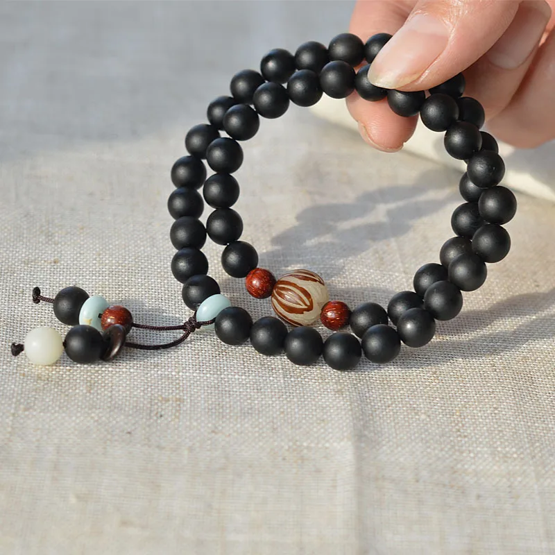 Tibetan-style original black ox horn Buddhist bead , small-leaf rosewood bracelet, Chinese medicine for health maintenan