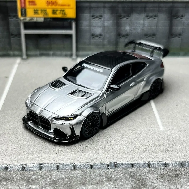 ชุดแต่ง SW 1/64 G82 M4 ADRO สีเงิน ของเล่นรถยนต์โลหะผสม โมเดลรถหล่อขึ้นรูป ของสะสมสำหรับเด็กผู้ชาย ของขวัญคริสต์มาส