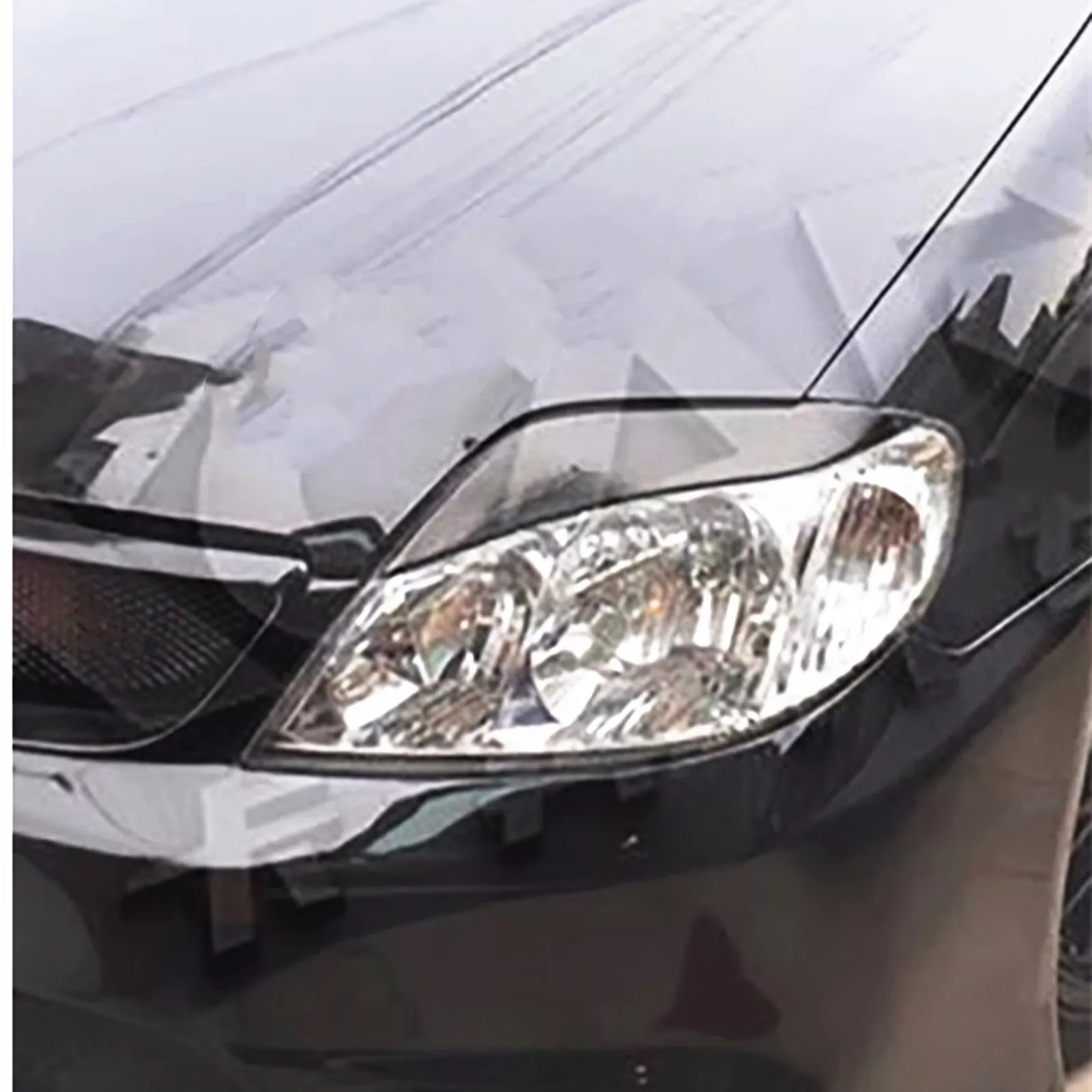 

Накладка на фары (реснички) из карбона для Toyota Corolla 2008-2011