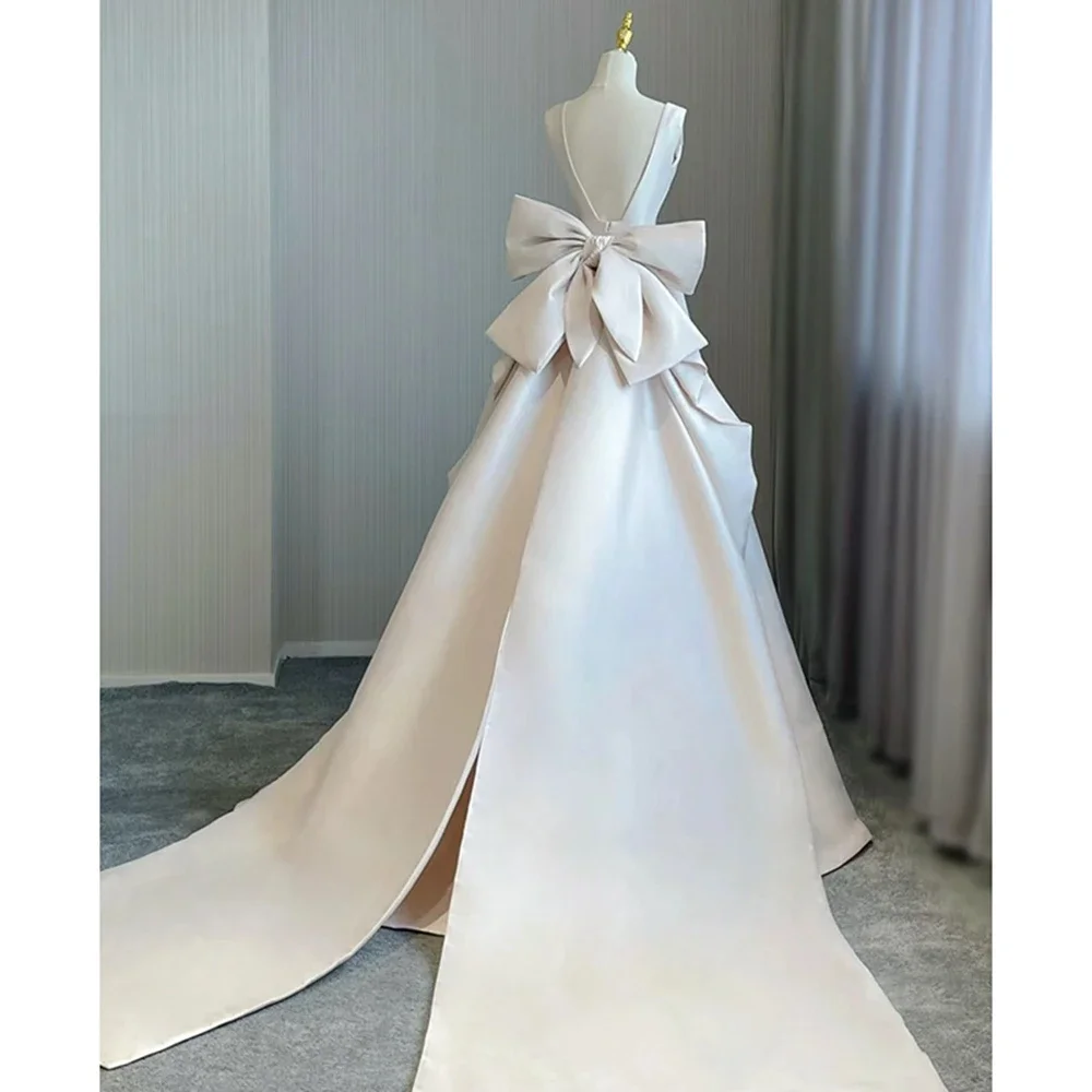 Elegant Satin V-Neck Wedding Dress Sleeveless A-Line Bridal Dress with Detachable Long Bow Train for Wedding