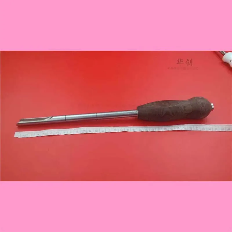 Stainless steel orthopedic instruments for tibia, bone chisel with wooden silicone handle. Orthopedic doctors use Kirschner wire