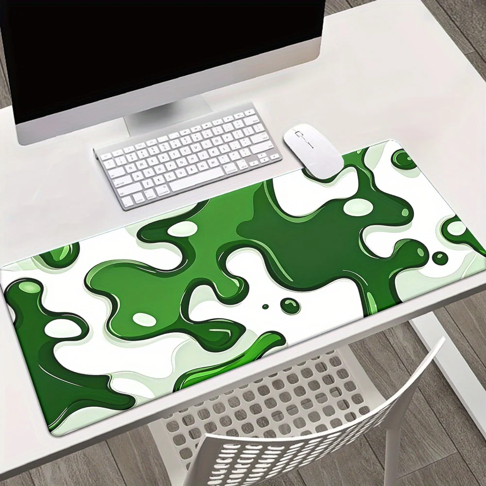 

The green liquid flow mousepad with an anti-slip rubber base and an abstract vortex design is suitable for gaming and office use