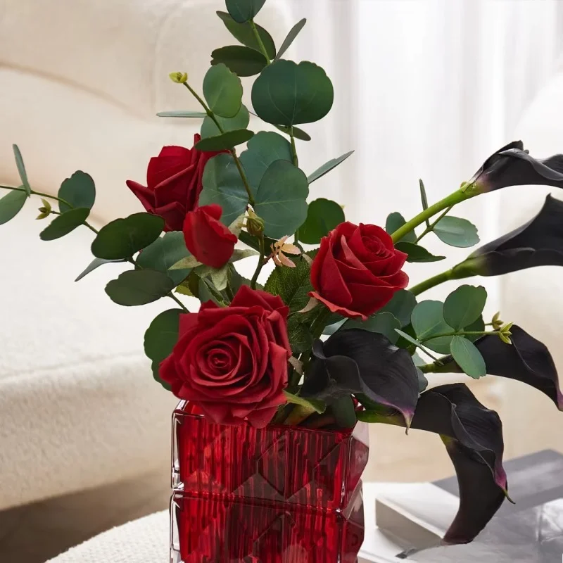 Decorative red rose dried flower arrangement with ceramic tabletop vase