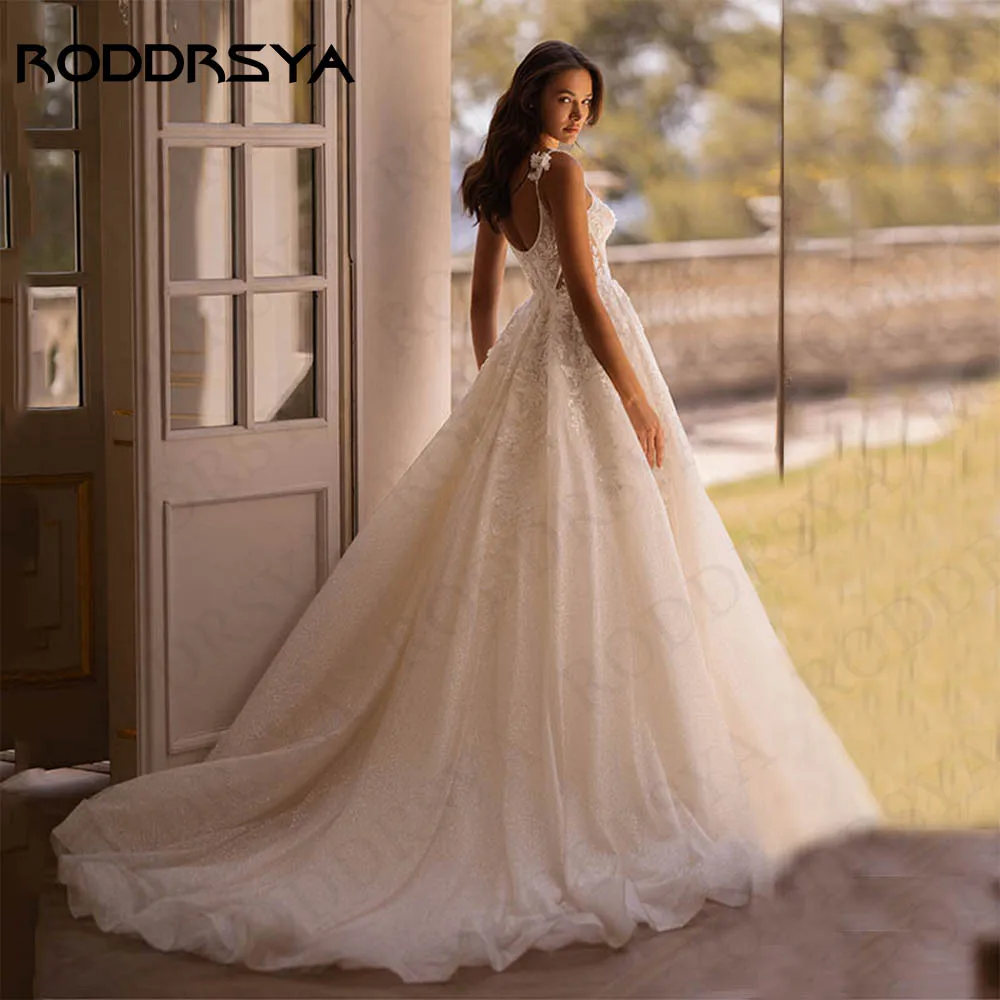 فساتين زفاف RODDRSYA خط للعروس خمر الخامس الرقبة السباغيتي الأشرطة vestido de novia الرباط سباركلي تول ثوب العروس سلسلة الزفاف الرجعية الخامس الرقبة السباغيتي الأشرطة فيستيدو دي نوفيا 2024 فستان الزفاف الدانتيل