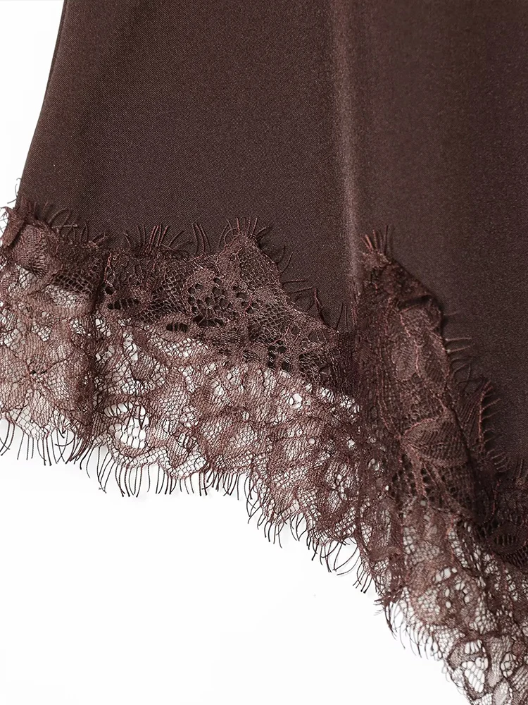 New European-style women's fashion skirt: stylish, versatile, elegant, simple, solid color, asymmetrical lace design.