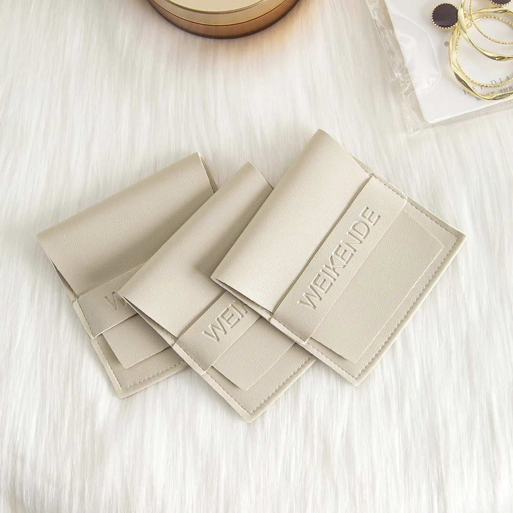 

Custom Logo Travel Organizer Bag New Bulk PU Leather Fashion Jewelry Pouch Wedding Gift Cosmetic Necklaces Earrings Pocket Sack