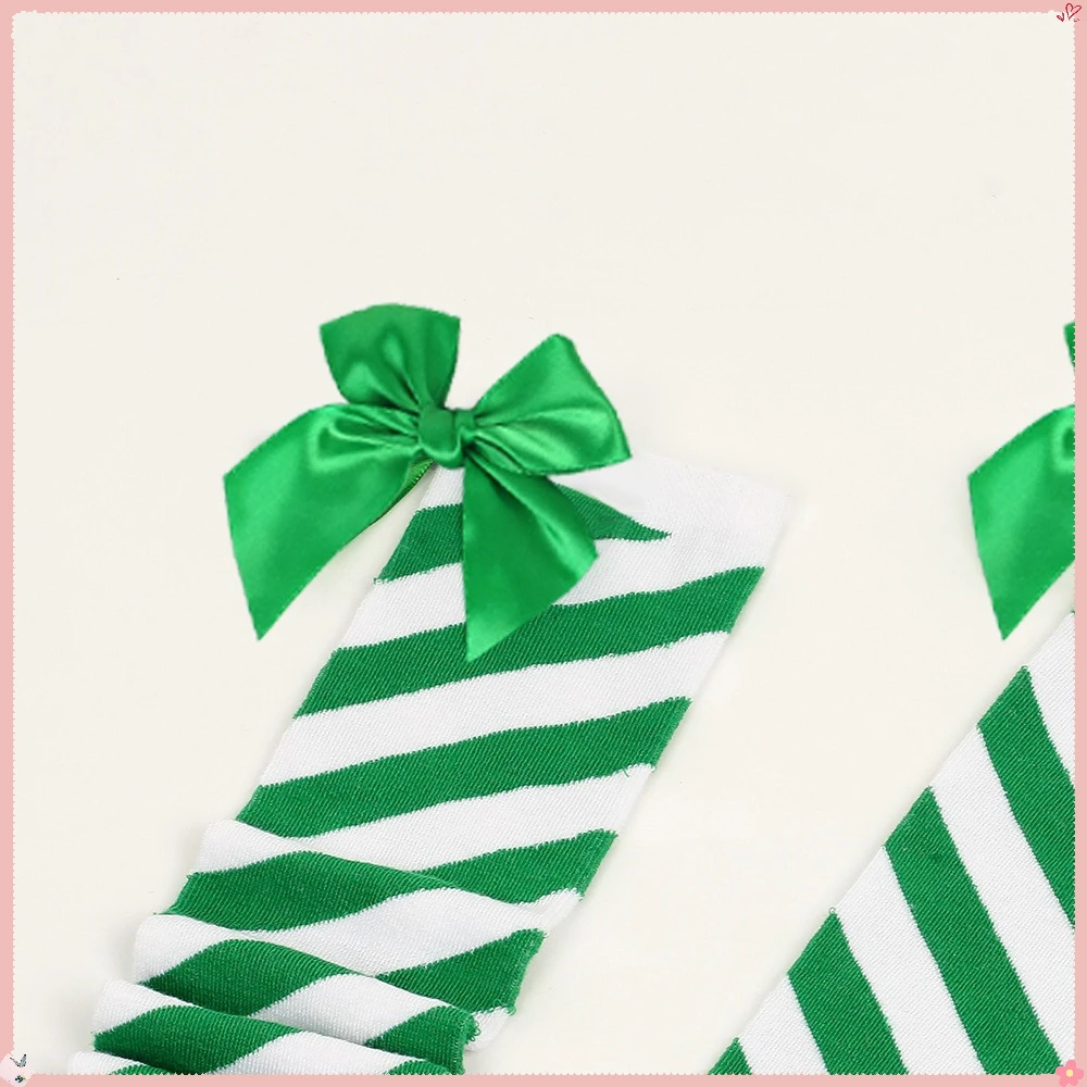 جوارب عيد الميلاد: جوارب مخططة قطرية معلمة على شكل فيونكة، جوارب بلون الحلوى، جوارب نسائية عالية الفخذ #5