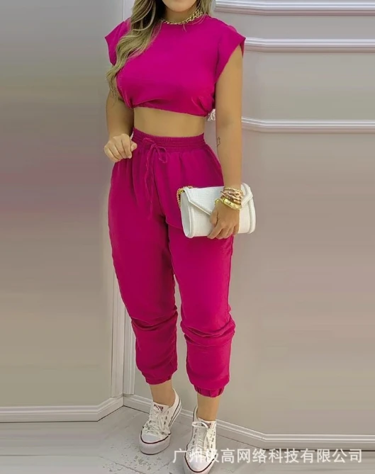 Conjunto informal de dos piezas para mujer, Top sin mangas con ombligo abierto y pantalones ajustados, Color sólido, Rosa y Rojo