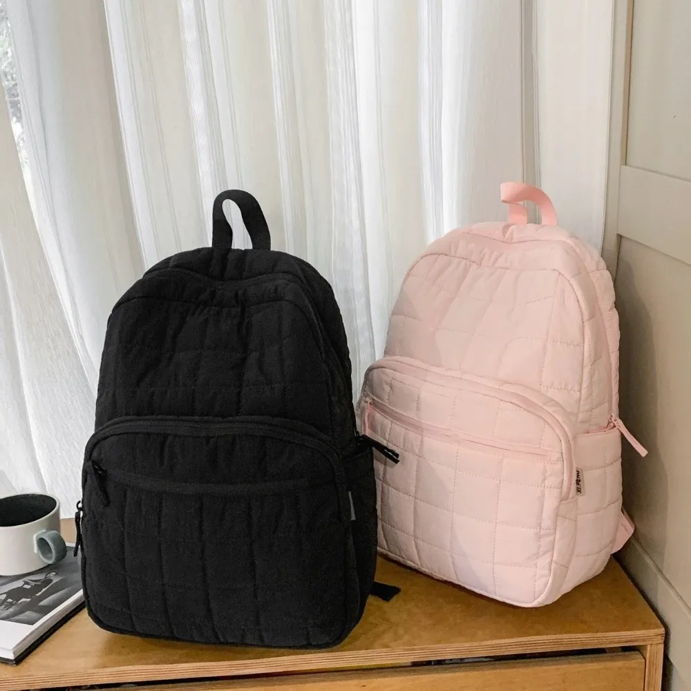 حقيبة ظهر مبطنة للسفر للجنسين بلون سادة من النايلون حقيبة مدرسية للطلاب بسعة كبيرة ومتعددة الجيوب للكمبيوتر المحمول