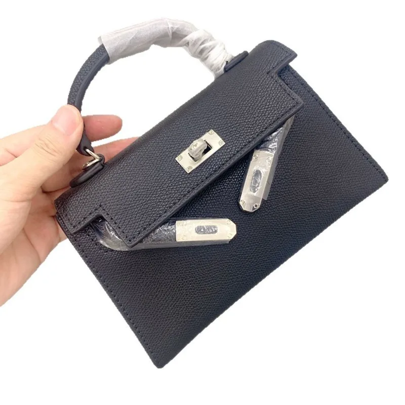 2025年新作の女性用絶妙なクロスボディバッグ、小さなバッグ、高級感のあるシルバーバックルミニバッグ、女性のための多用途ハンドバッグ