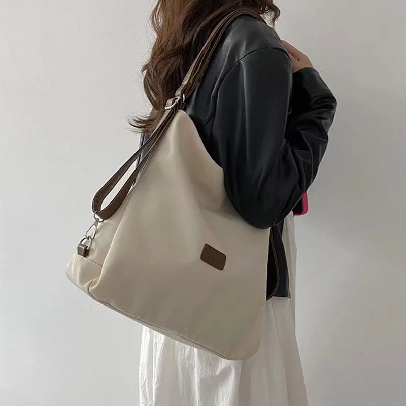Płócienna Tote torba damska nowa wysoka pojemność i minimalistyczna plecak szkolny moda wszechstronna na co dzień jeden Crossbody na ramię
