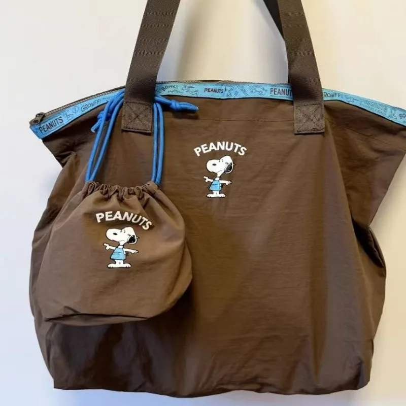 Disney Cute Snoopy Borsa da viaggio per cartoni animati di grande capacità Borsa per bagagli Elegante trolley con maniche Pieghevole portatile Regalo per le vacanze