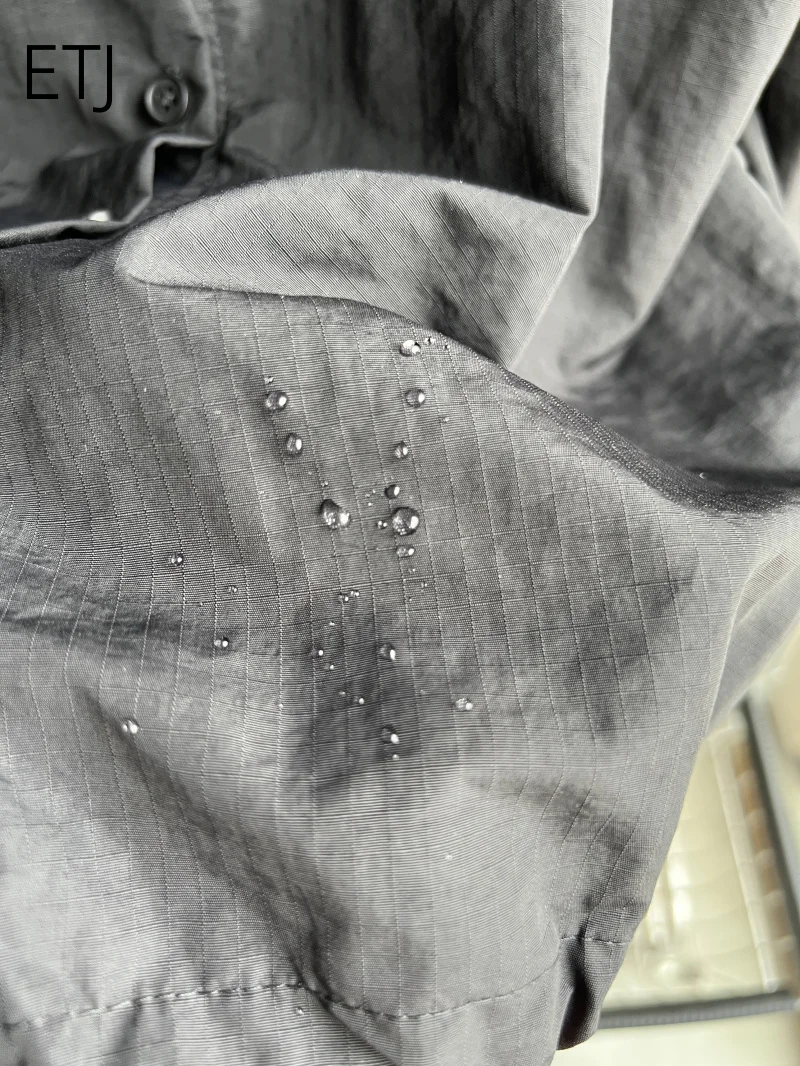 ETJ 2026 Damen Polyester Windbreaker mit Stehkragen, Knopfleiste, Leichtgewicht, Wasserabweisend, Puffärmel, Oversize-Jacke – Detail 19