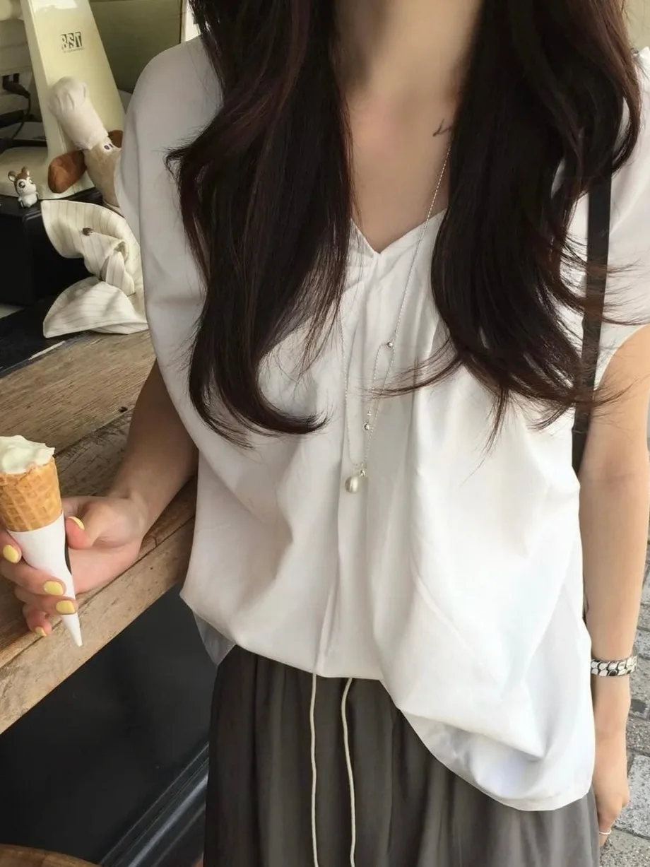 

Ele ort Sve V-Ne irt Women's Summer New Sle Design Knot Top Casual Chic Fem Blouse Commute Loose Fit Pure C...