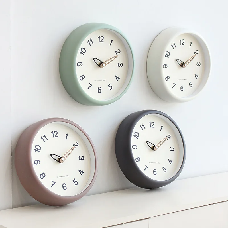 

Milky white ins wall clock, living room decoration, simple cream style clock, modern fashion wall clock, silent and no punching