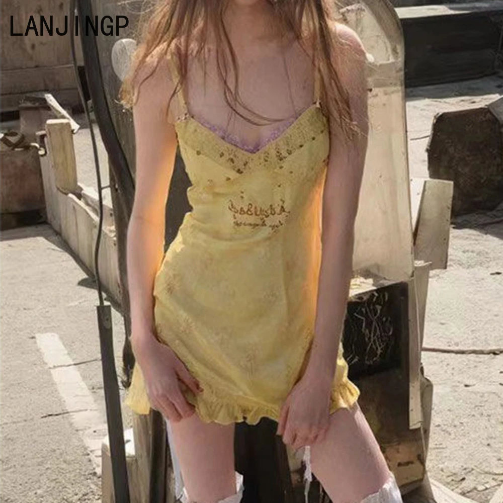 

Lemon yellow retro fresh romantic butterfly embroidery waist thin suspender rivets old short skirt women