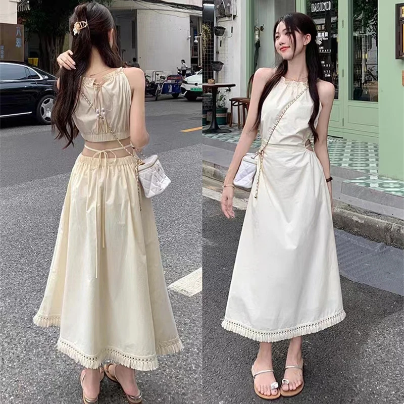 Fashion and Casual Summer Halter Hollow Sleeveless Tassel Solid Color Simple and Generous Hem Holiday Beach Women\'s Long Dress