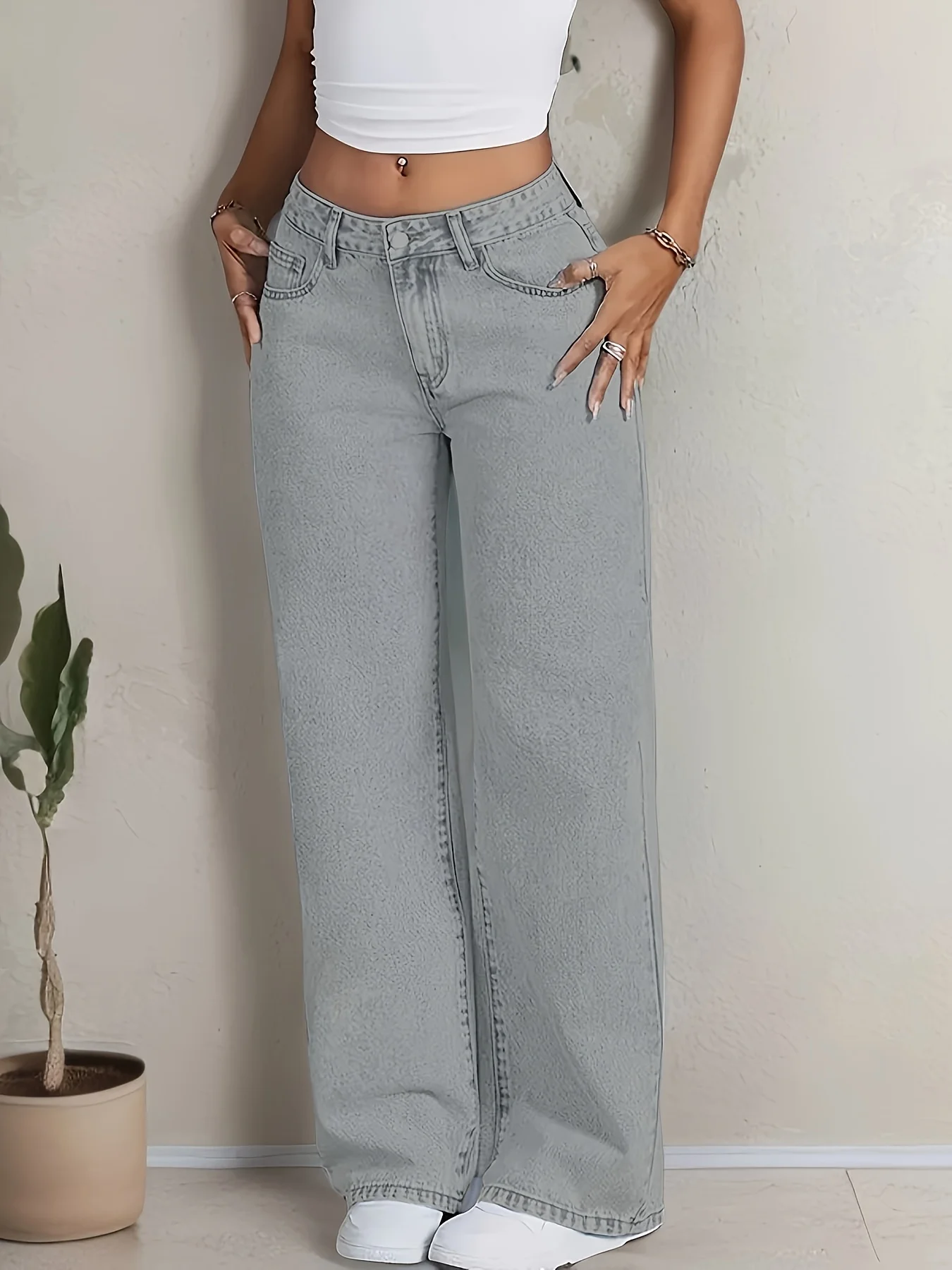 Hellblaue, hoch taillierte, gerade Vintage-Jeans mit Schleifenstickerei